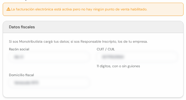 Aviso amarillo de facturación y cuadro Datos fiscales con razón social, CUIT y domicilio tapados