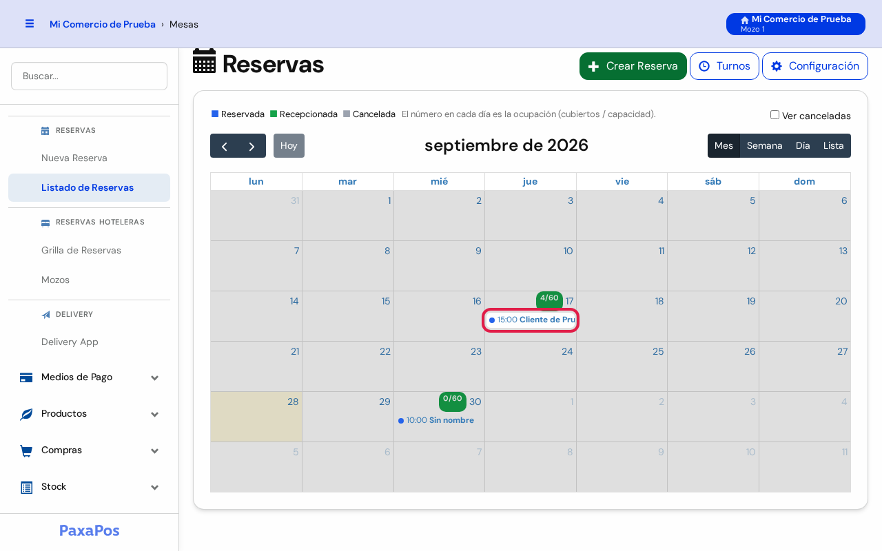 Calendario con una reserva marcada en rojo
